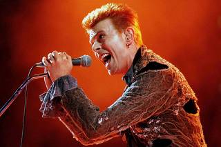 File photo of David Bowie performing at the Panathinaikos stadium in Athens