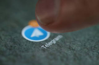 FILE PHOTO: The Telegram app logo is seen on a smartphone in this illustration