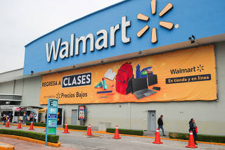FILE PHOTO: Logo of Walmart is pictured outside a store in Mexico City