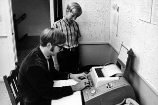 Bill Gates, standing, and his friend Paul Allen around 1969. The two later founded Microsoft. (Lakeside School via The New York Times)