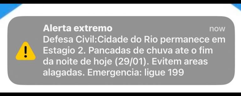 Informação em forma de notificação no celular， em retângulo cinza com um símbolo amarelo de atenção ao lado