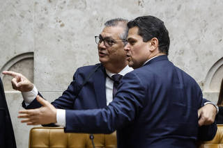 O ministro Flavio Dino e o senador Davi Alcolumbre 