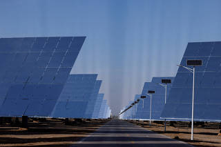 FILE PHOTO: Organised media tour to Dunhuang Photovoltaic Industrial Park