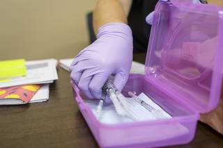 Like people with long Covid, some with post-vaccination syndrome showed reactivation of Epstein-Barr virus, which is linked to mononucleosis, multiple sclerosis and other conditions. (Matthew Busch/The New York Times)