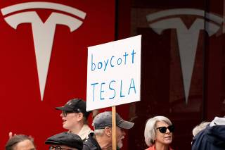 Demonstrators Protest Against Elon Musk In Seattle, Washington