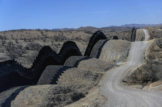 The U.S.-Mexico border as seen from a Border Patrol helicopter between Sasabe and Nogales, Ariz., on Feb. 7, 2025. (Adriana Zehbrauskas/The New York Times)