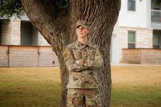 Sgt. First Class Julia Becraft, an infantry squad leader who says that she has become a better leader since transitioning, outside her apartment in Georgetown, Texas, Jan. 29, 2025. (Desiree Rios/The New York Times)