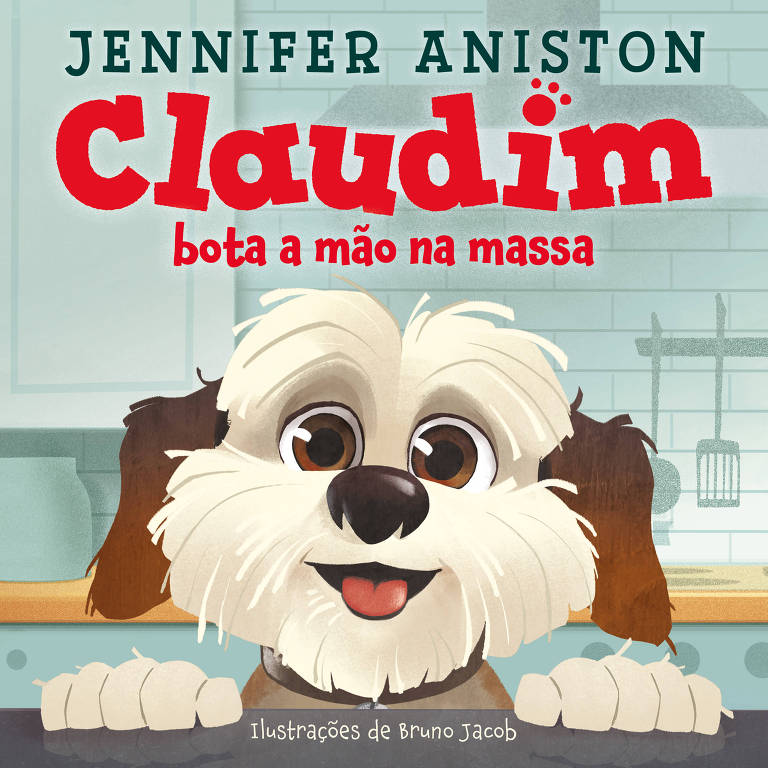 Capa do livro 'Claudim bota a mão na massa', escrito por Jennifer Aniston. A imagem apresenta um cachorro da raça Shih Tzu, com pelagem branca e marrom, olhando para a frente com uma expressão amigável. O fundo é uma cozinha com elementos sutis. O título do livro está em letras grandes e vermelhas, e o nome da autora está em letras brancas no topo.