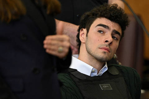 Luigi Mangione, the suspect in the killing of UnitedHealth Group chief executive Brian Thompson, appears in Manhattan Supreme Court on New York state murder and terrorism charges in New York City, U.S., February 21, 2025. Curtis Means/Pool via REUTERS?     TPX IMAGES OF THE DAY ORG XMIT: MEX
