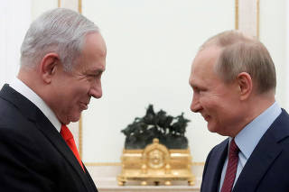 FILE PHOTO: Russian President Vladimir Putin meets with Israeli Prime Minister Benjamin Netanyahu in Moscow