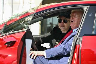 US President Trump unveils a Tesla car at the White House