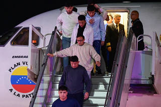 Venezuelan migrants arrive on a deportation flight from the U.S. at the Simon Bolivar International airport in Maiquetia