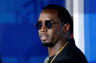 FILE PHOTO: Rapper Sean Diddy Combs arrives at the 2016 MTV Video Music Awards in New York