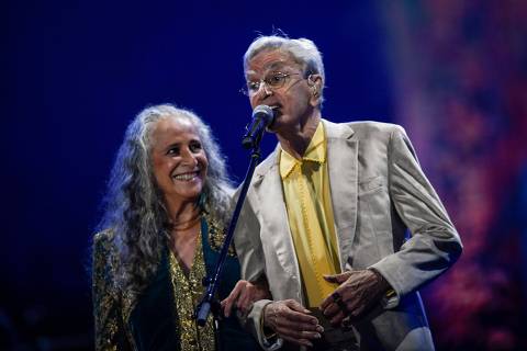 Brazilian musicians and siblings Maria Bethania (L) and Caetano Veloso perform at the main stage ahead of the New Year celebration at Copacabana Beach in Rio de Janeiro, Brazil, on December 31, 2024. A traditional fireworks display and free music concerts will be held to welcome the new year during the New Year's Eve celebration in Rio de Janeiro, Brazil 2025. The Rio Mayor's Press Office considers it the world's biggest New Year's Eve in the world, with 2 million people expected to attend. (Photo by Daniel RAMALHO / AFP)