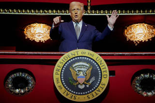 U.S. President Donald Trump stands at the presidential box at the Kennedy Center in Washington