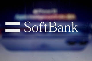 FILE PHOTO: The logo of SoftBank is displayed at a company shop in Tokyo