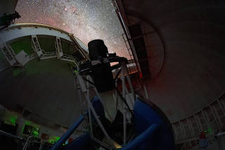 DESI imaging the night sky at Kitt Peak National Observatory in Arizona. (KPNO/NOIRLab/NSF/AURA/T. Slovinský via The New York Times)
