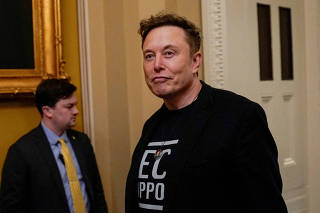 FILE PHOTO: Elon Musk attends a luncheon with members of the Senate Republican Conference on Capitol Hill in Washington, D.C.
