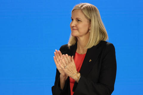 Olympics - 144th IOC Session - Press conference - Costa Navarino, Pylos, Greece - March 21, 2025 The new IOC president Kirsty Coventry applauds during the press conference REUTERS/Louisa Gouliamaki