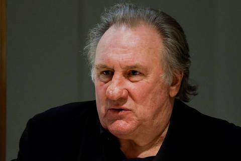 French actor Gerard Depardieu looks on at the courthouse, as his trial over accusation of sexual assault of two women, which prosecutors say took place during the filming in 2021 of 