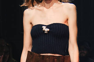 A model presents a look at a fashion show in Milan, Feb. 27, 2025. (Simbarashe Cha/The New York Times)