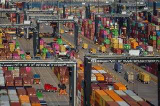 Trucks transport cargo at the Bayport Container Terminal in Seabrook, Texas