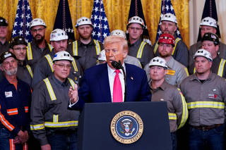 U.S. President Donald Trump signs executive orders in Washington