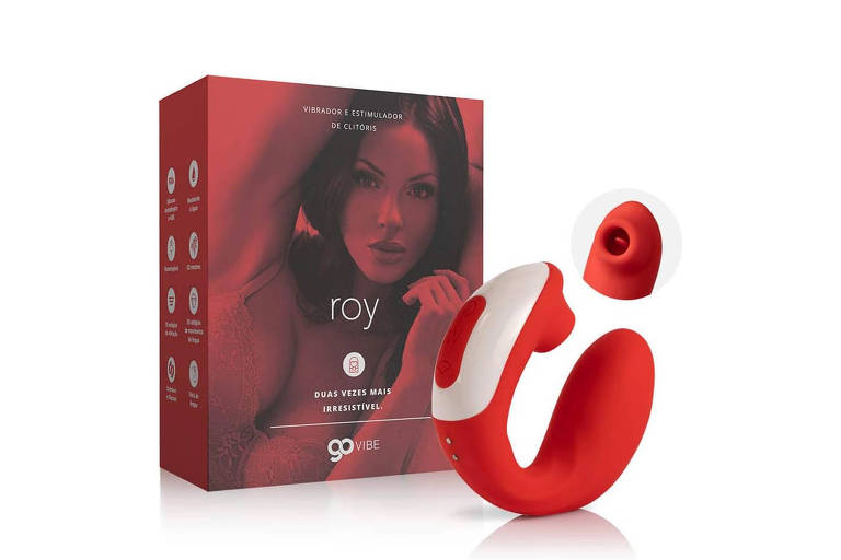 A imagem mostra um vibrador chamado Roy, que é de cor vermelha e possui um design curvo. O vibrador está posicionado ao lado de sua embalagem, que é predominantemente vermelha e apresenta uma imagem de uma mulher com cabelo escuro. A embalagem contém informações sobre o produto, incluindo o nome 'roy' e a marca 'go vibe'.