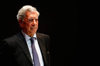 FILE PHOTO: Peruvian writer and Nobel literature laureate Vargas Llosa attends a forum in support of Venezuela's opposition in Caracas