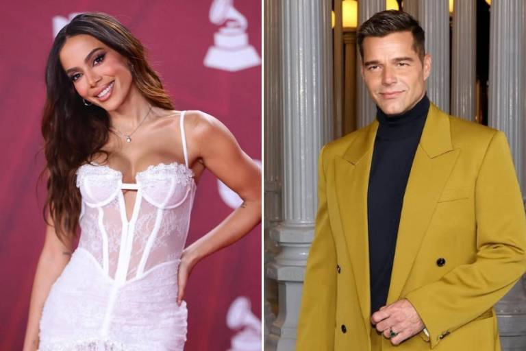 A imagem mostra duas pessoas em um evento. À esquerda, uma mulher com cabelo solto, usando um vestido branco transparente com detalhes em renda. À direita, um homem com cabelo curto, vestido com um terno amarelo e uma blusa preta por baixo. O fundo é decorado com elementos que sugerem um evento de premiação.