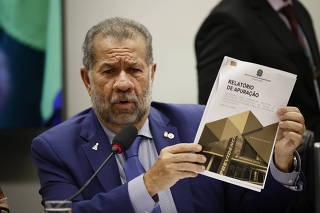 O ministro Carlos Lupi na Comissão de Previdência, Assistência Social da Câmara