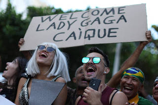 Lady Gaga's fans gather ahead of her concert in Copacabana beach, in Rio de Janeiro