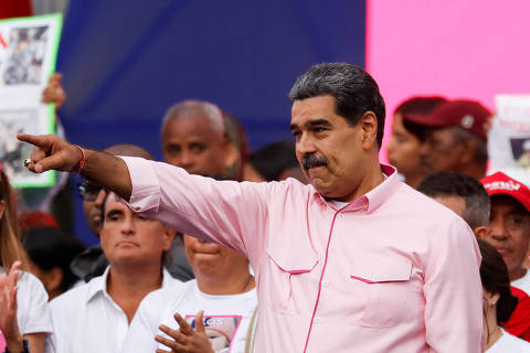 Venezuela's President Nicolas Maduro gestures as he addresses the crowd during May Day celebrations, in Caracas, Venezuela, May 1, 2025. REUTERS/Leonardo Fernandez Viloria ORG XMIT: GGGLFV03