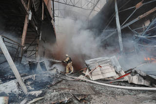 Aftermath of a Russian drone strike in Kharkiv