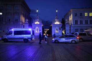 Polish police secure an area at the Warsaw University after an attack with an axe