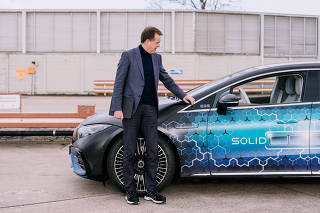 Uwe Keller, the head of battery development at Mercedes-Benz, with a Mercedes sedan powered by a battery made by the U.S. startup Factorial Energy, in Stuttgart, Germany, March 17, 2025. (Felix Schmitt/The New York Times)