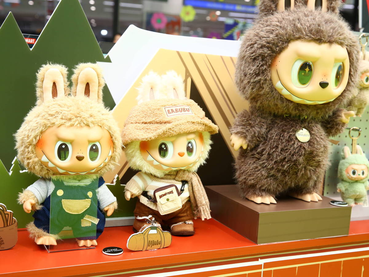 (240710) -- BANGKOK, July 10, 2024 (Xinhua) -- Toys themed on Labubu, a popular furry doll from Chinese toy company Pop Mart, are pictured during the opening ceremoy of a new offline store of Pop Mart in Bangkok, Thailand, July 5, 2024. Chinese toy company Pop Mart opened its sixth offline store in Bangkok and achieved sales exceeding 10 million yuan (about 1,375,743 U.S. dollars) on its opening day recently. Setting a new single-day sales record for overseas stores, the art toy company renowned for its blind box collectibles is taking Thailand by storm.
   TO GO WITH 
