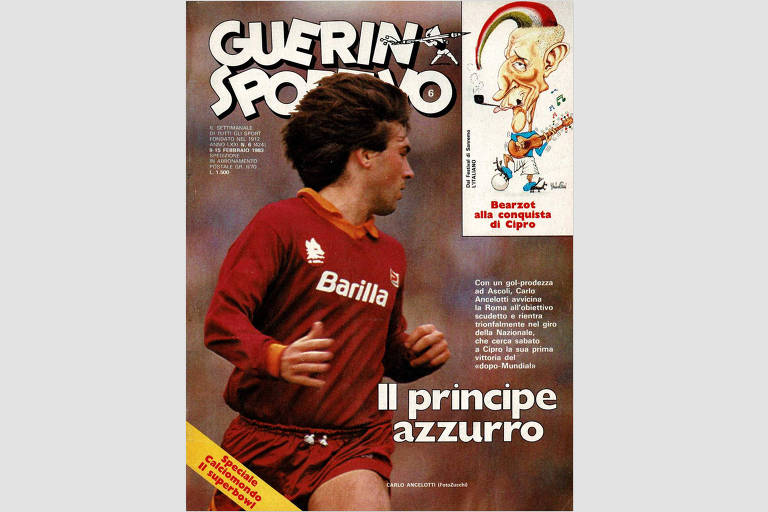 A imagem mostra a capa da revista Guerin Sportivo, com um jogador de futebol em movimento, vestindo um uniforme vermelho com o logotipo da Barilla. O título da revista está no topo, em letras grandes e brancas, e há uma caricatura de um personagem no canto superior direito. Abaixo da imagem do jogador, está escrito 'Il principe azzurro'.