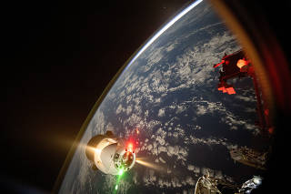 The docking of a SpaceX Dragon spacecraft carrying cargo to the International Space Station in December 2024. (Don Pettit/NASA via The New York Times)