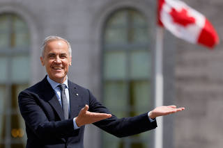 Canada's PM Carney attends a press conference, in Ottawa, Ontario