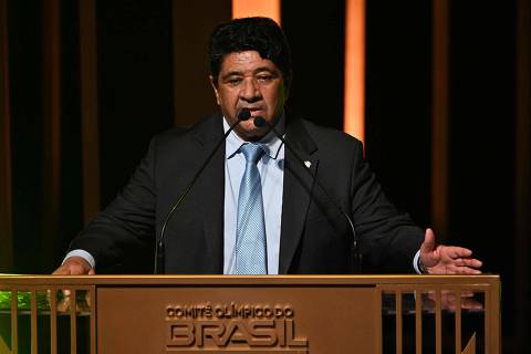 (FILES) The president of the Brazilian Football Confederation, Ednaldo Rodrigues, delivers a speech after receiving the best team of the year award for the women's national football team during the Brazil Olympic Award, a ceremony to celebrate the best Brazilian olympic athletes, at Vivo Rio music hall in Rio de Janeiro, Brazil, on December 11, 2024. A court in Rio de Janeiro ordered on May 15, 2025, the dismissal of Brazilian football federation head Ednaldo Rodrigues, ruling that a signature error nullified his employment contract. (Photo by Mauro PIMENTEL / AFP)