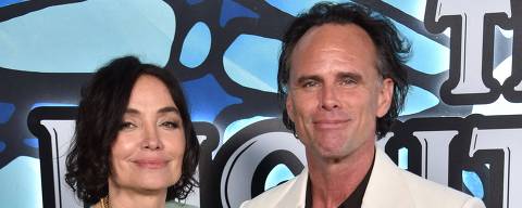 US actor Walton Goggins (R) and his wife director Nadia Conners attend the final season premiere of HBO's 