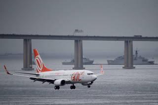 FILE PHOTO: A Boeing 737 airplane of Brazilian airlines GOL Linhas Aereas prepares to land at Santos Dumont airport in Rio de Janeiro
