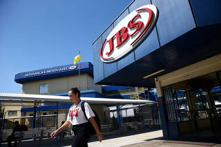 FILE PHOTO: Brazilian beef giant JBS commits to reducing climate-damaging emissions until 2040