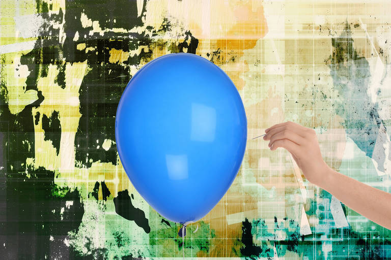 Mão segurando uma agulha junto de um balão na cor azul