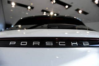FILE PHOTO: The logo of German carmaker Porsche AG
