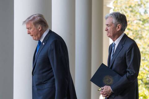 (FILES) US President Donald Trump walks with Jerome Powell, his nominee to be Federal Reserve chairman, at the White House  in Washington, DC, on November 2, 2017. Powell told Donald Trump on May 29, 2025, that the bank's decision-making process must remain 