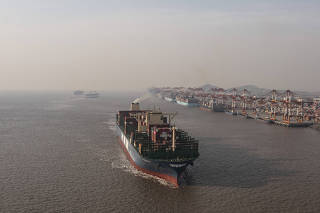 A cargo ship at Yangshan Port in Shanghai, Feb. 1, 2025. (The New York Times)
