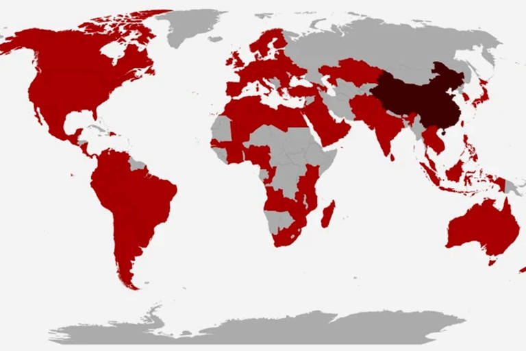 Um mapa-múndi onde países estão destacados em vermelho e cinza. Os países em vermelho representam uma determinada categoria ou status, enquanto os países em cinza não estão destacados. A China é uma das áreas mais escuras em vermelho, indicando uma ênfase particular. O mapa não possui legendas ou informações adicionais visíveis.