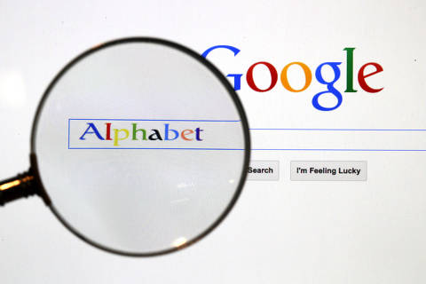 FILE PHOTO: A Google search page is seen through a magnifying glass in this photo illustration taken in Berlin, August 11, 2015.   REUTERS/Pawel Kopczynski/File Photo/File Photo ORG XMIT: FW1